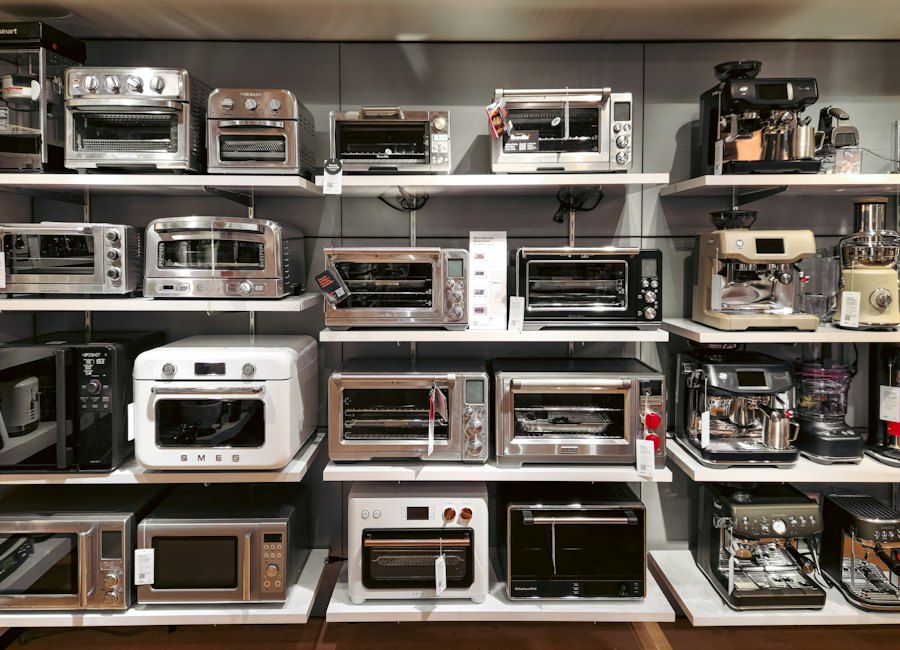 Shelves of appliances on a discount store floor