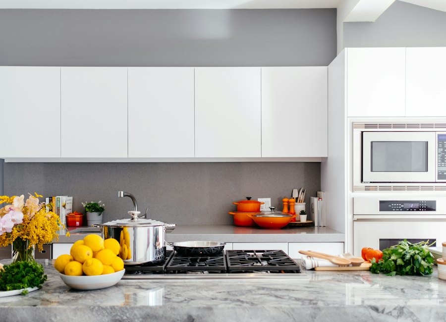 A kitchen range with pots on the cooktop